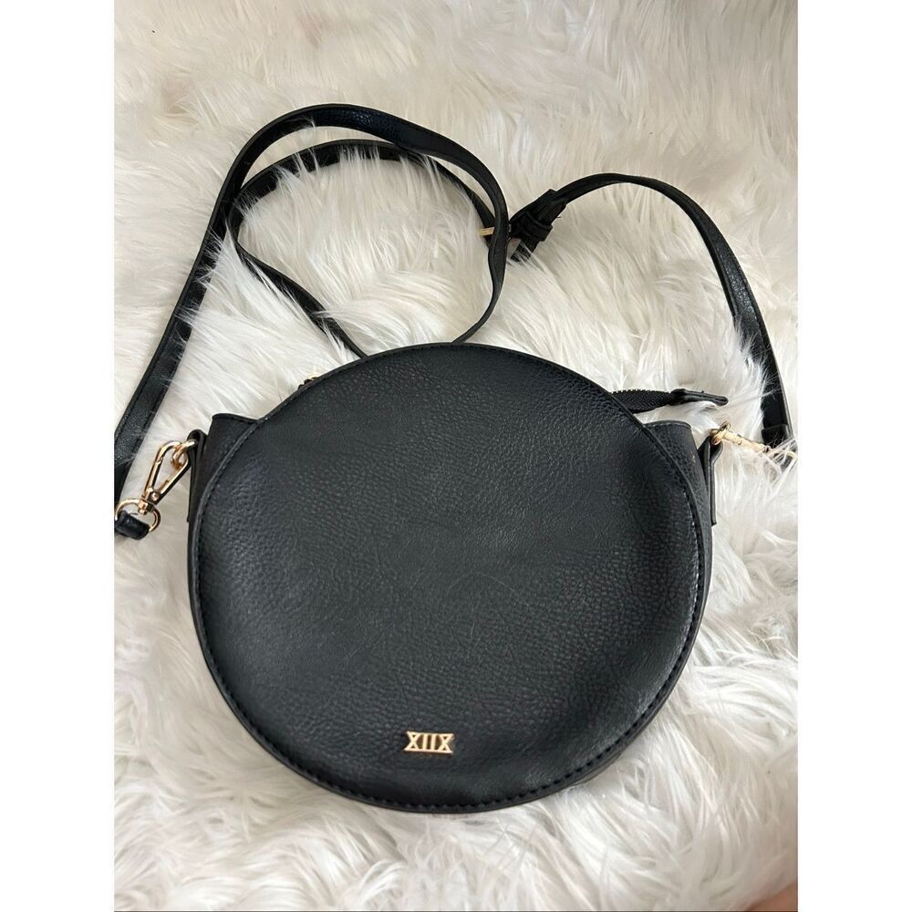 Collection XIIX Black Leather Pocket Adjustable Strap Round Crossbody Bag